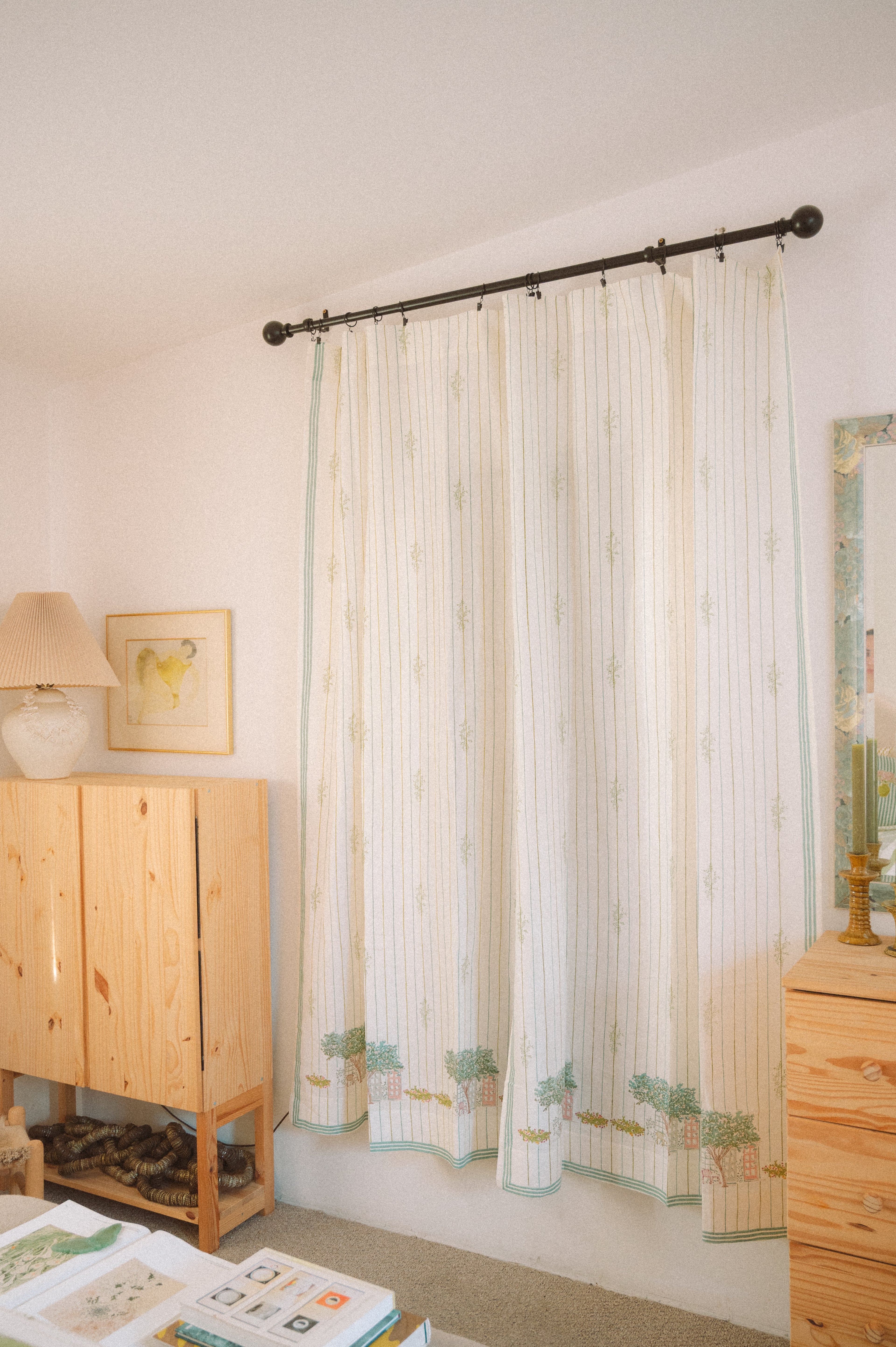 Travel Ispired style living room featuring hand-printed cotton-linen drapes with a traditional Block printing technique. 