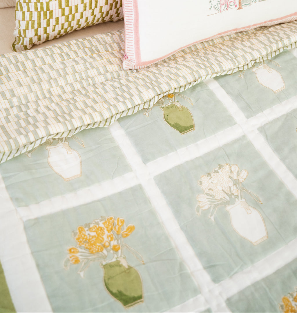 Journey of a river - Reversible hand-block printed cotton throw, 50×70 inches, featuring different artisanal patterns on both sides.