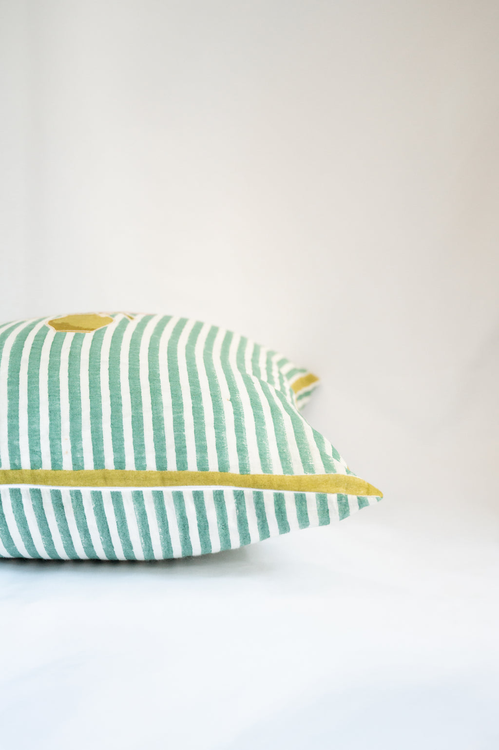 Square hand-block printed cushion cover in MONA'S FLOWER CUSHION COVER featuring Flower arrangement botanical motifs on natural handwoven linen fabric.